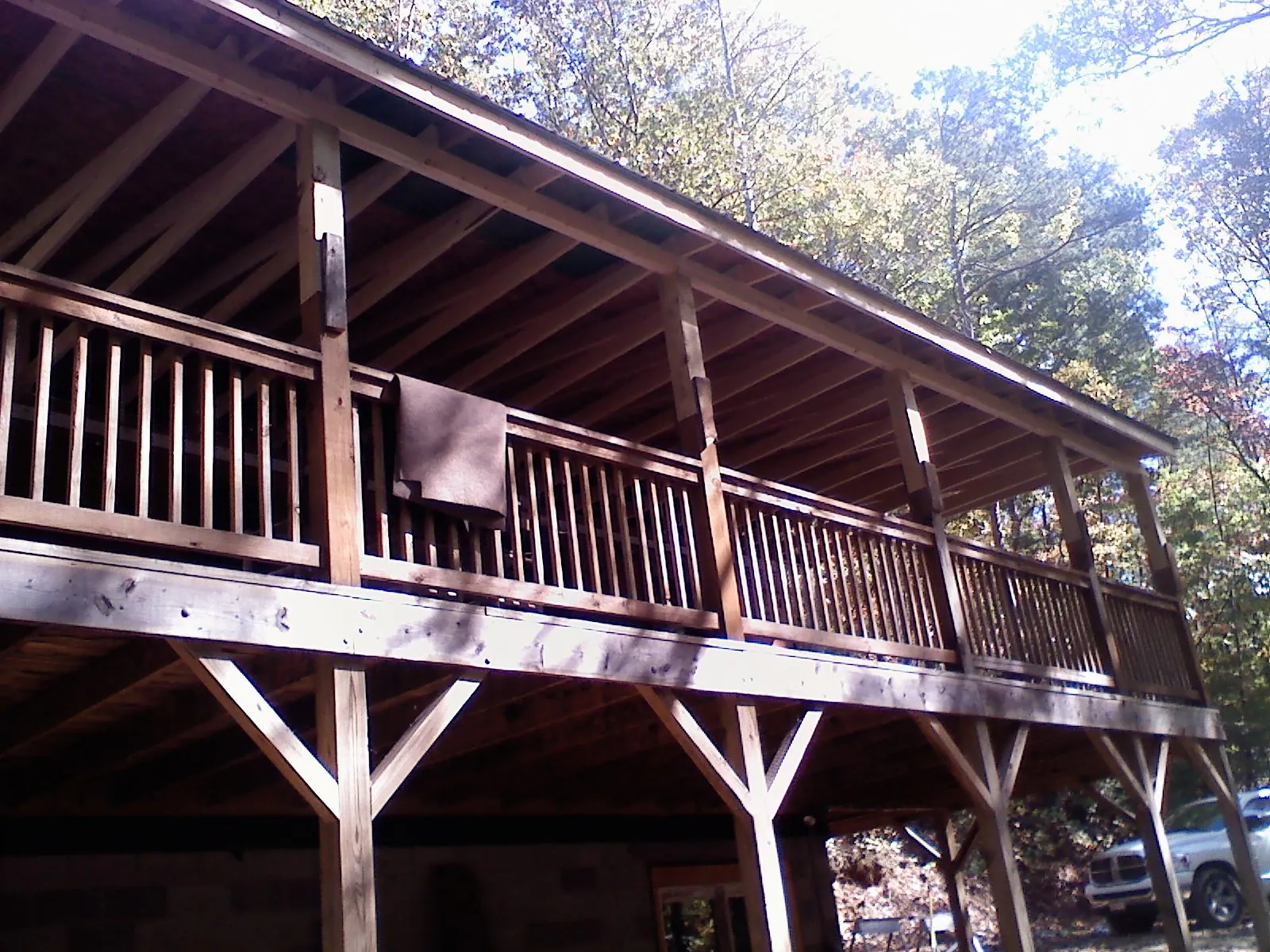 Timber framing under a new elevated porch and deck — Roof Leak Repair in North Port by Roofing Brothers